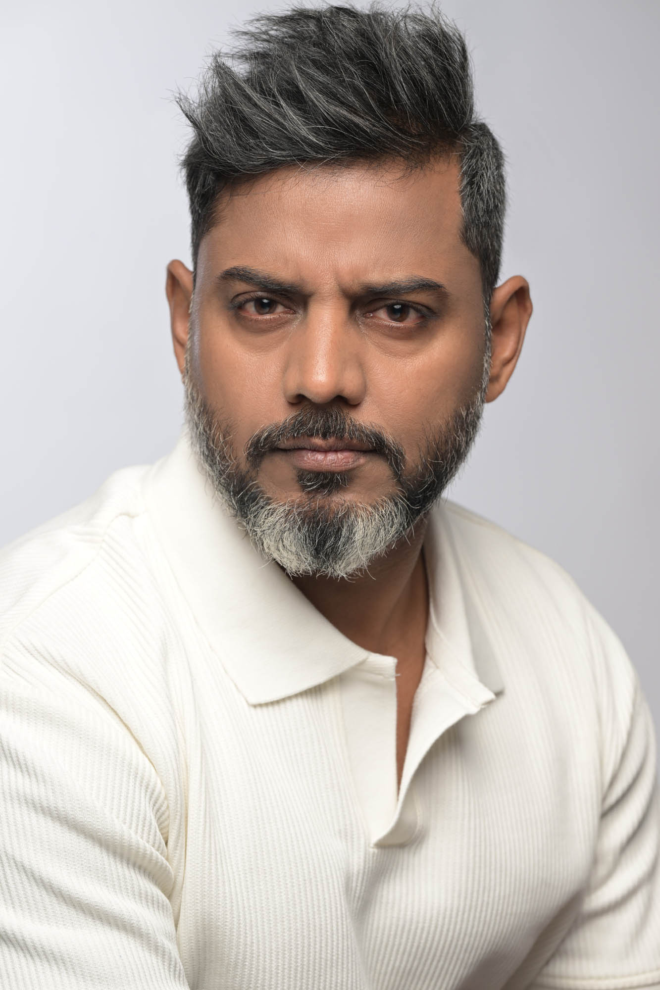 become a model at age 40 mature male model serious headshot
