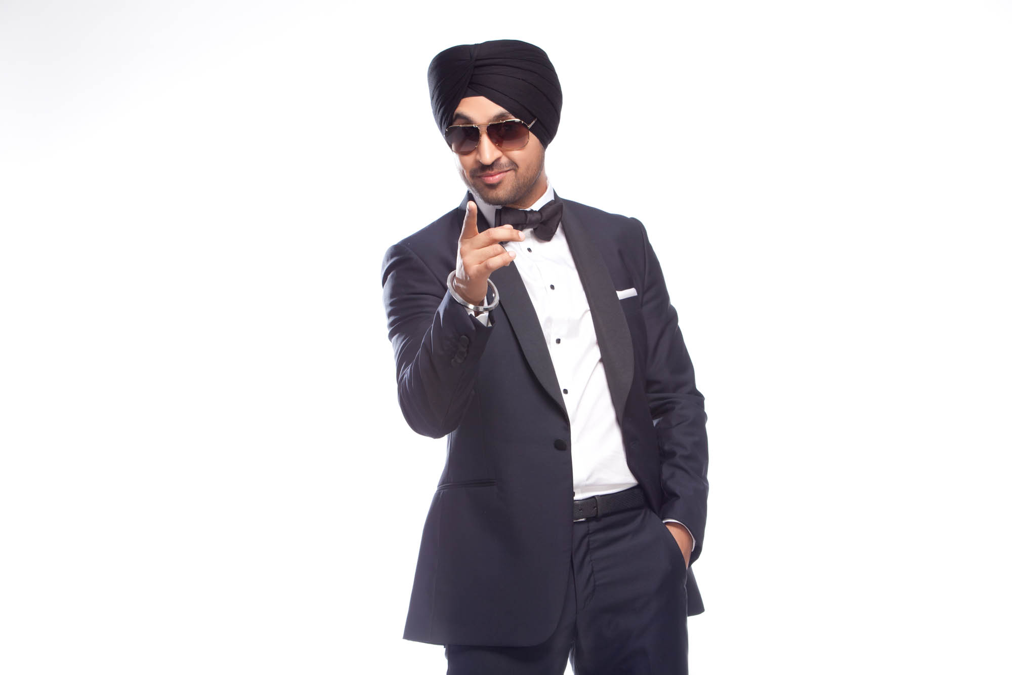 Diljit Dosanjh Photoshoot full length tuxedo portrait by Praveen Bhat