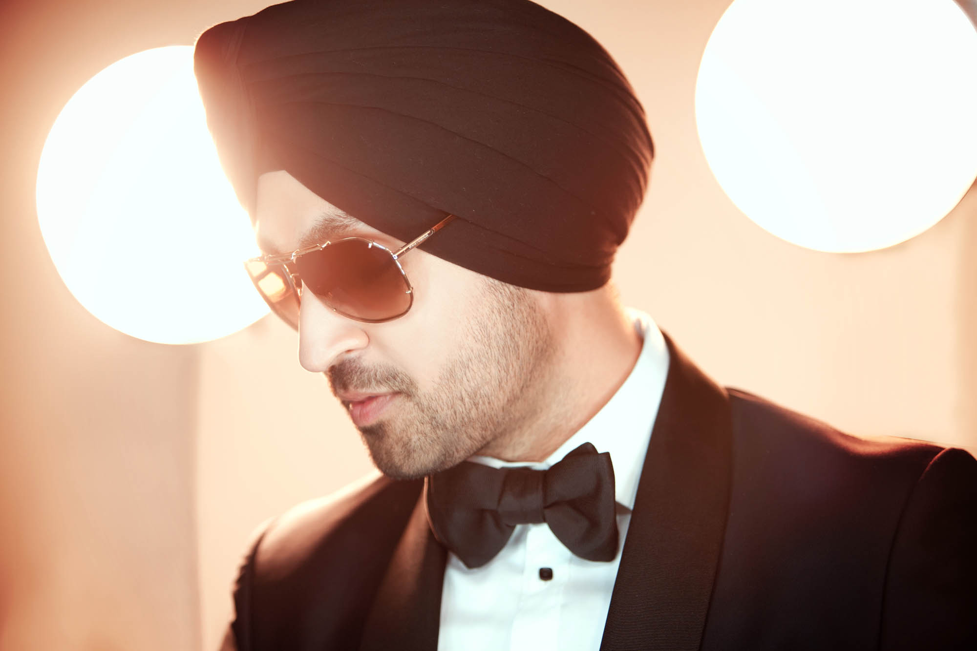 Diljit Dosanjh Photoshoot close up portrait with sunglasses and black turban