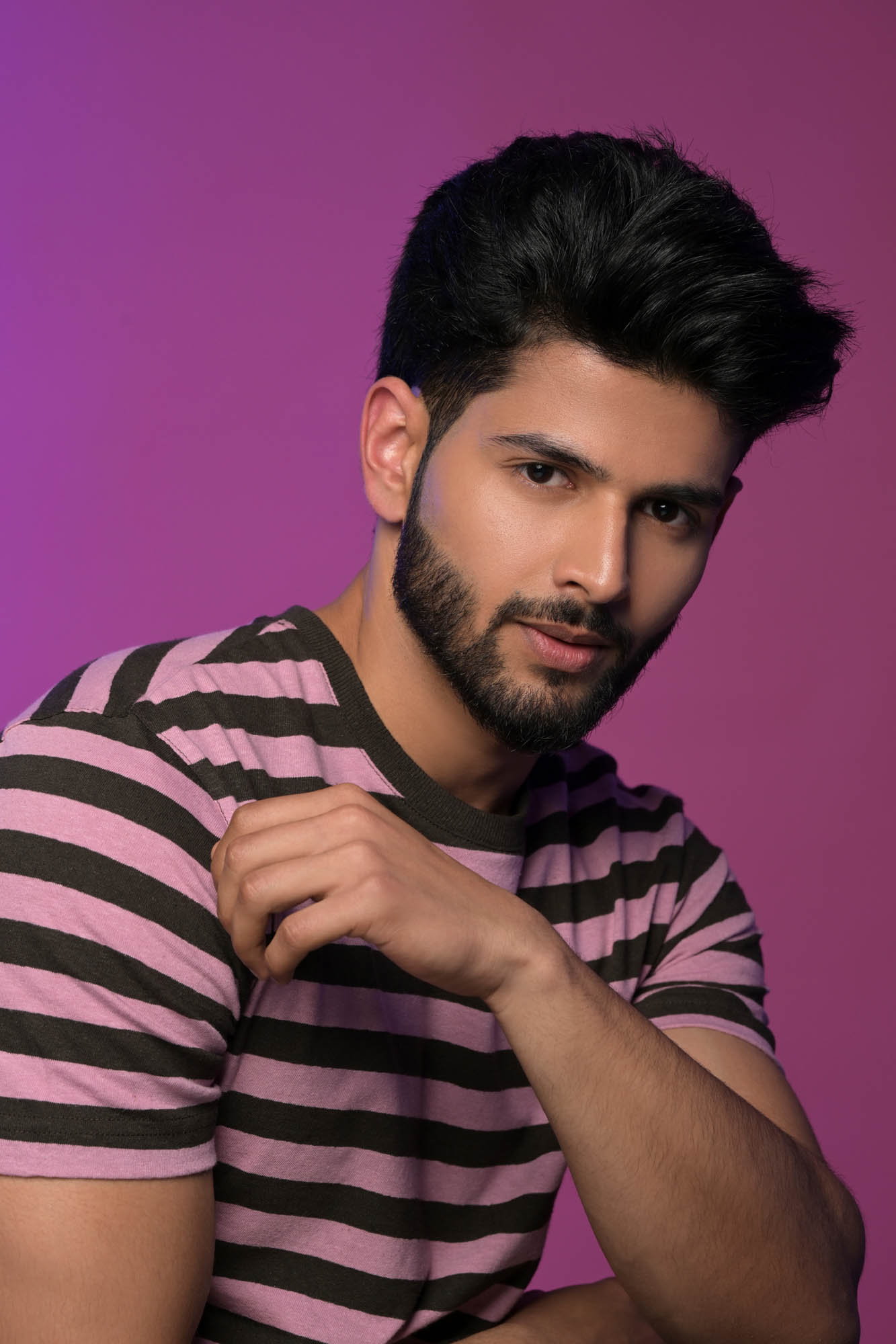 model portfolio for beginners in india male portrait with pink background
